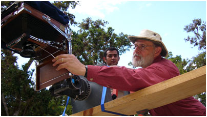 Director Lebrun adjusts the 8x10 still camera over a carved altar at Copán.