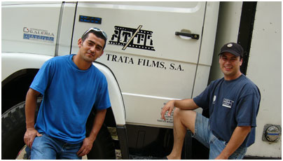 Grip-electricians Raul Salazár and Javier Guadarrama with the equipment truck from Panavision.